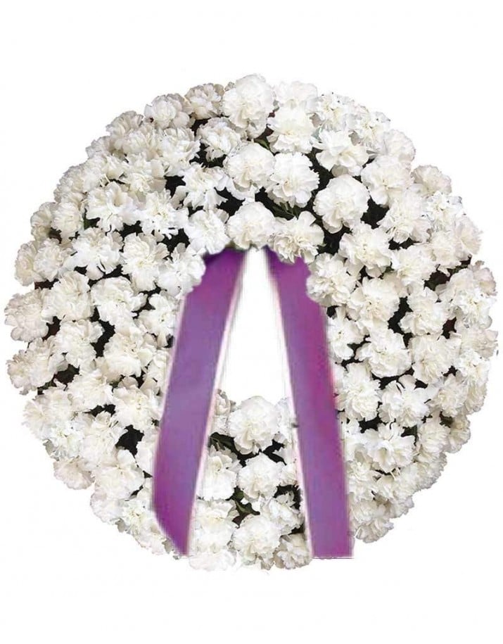 Corona de claveles blancos para difuntos.