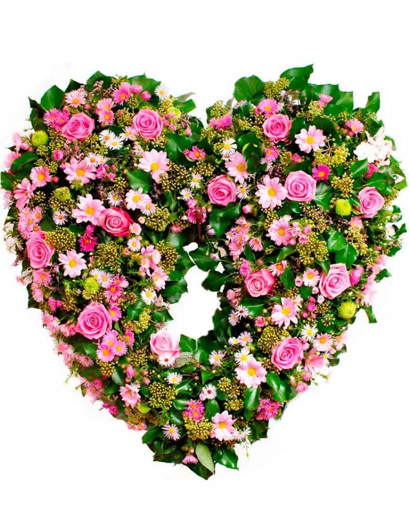 Corazón de flores para difuntos en Madrid.