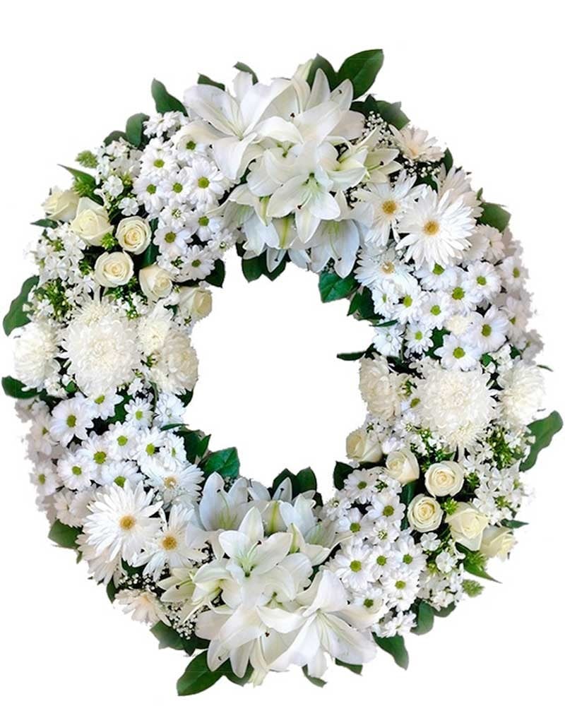 Corona de flores blanca precios en Madrid.