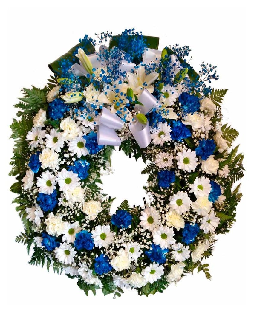 Coronas de flores azul  para muertos en Madrid