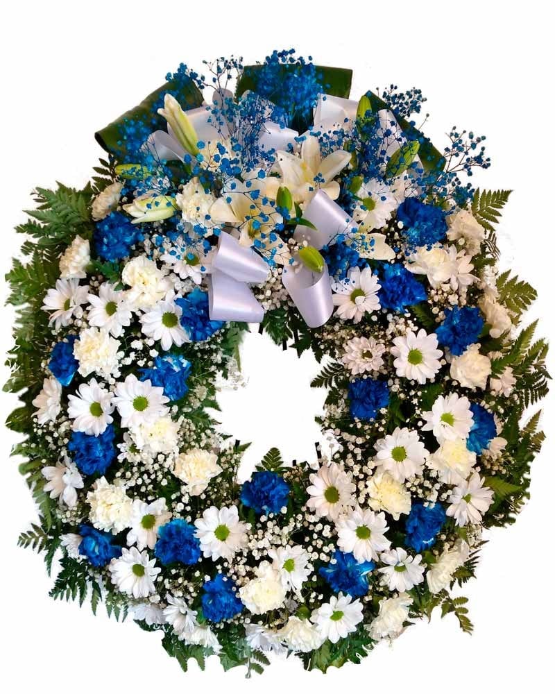 Coronas de flores azul  para muertos en Madrid
