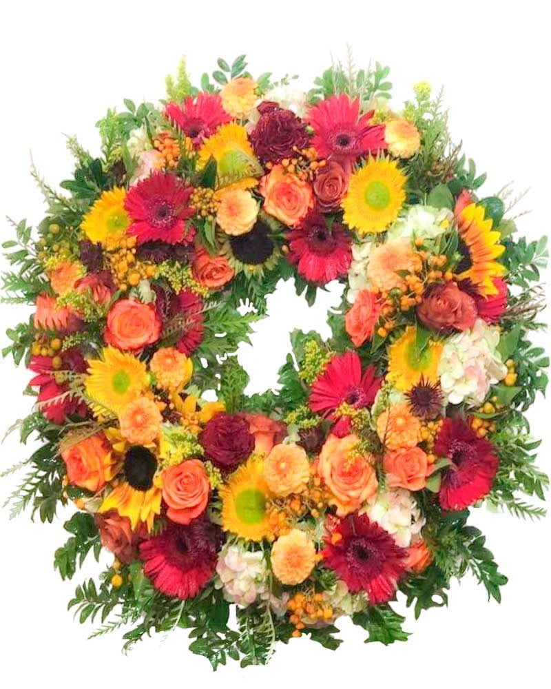 Corona de flores para funeral en tanatorio de la M30 en Madrid.