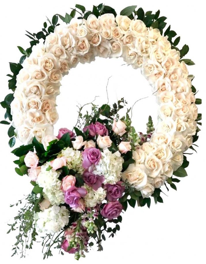 Venta y envío de coronas de flores para condolencias en Madrid.