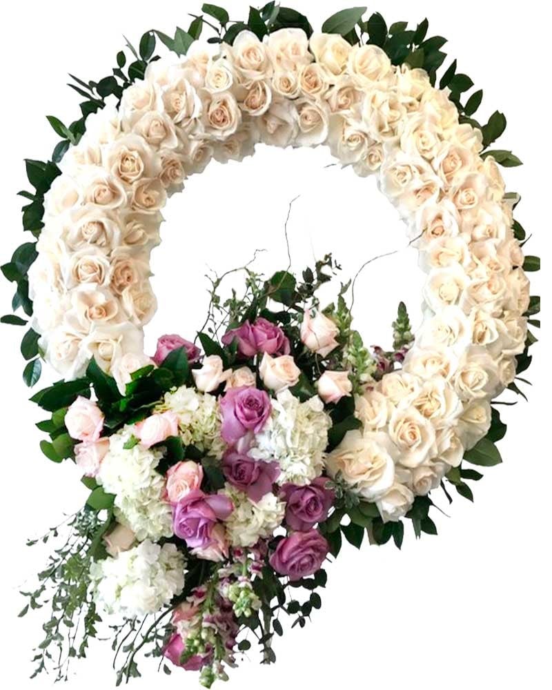 Venta y envío de coronas de flores para condolencias en Madrid.